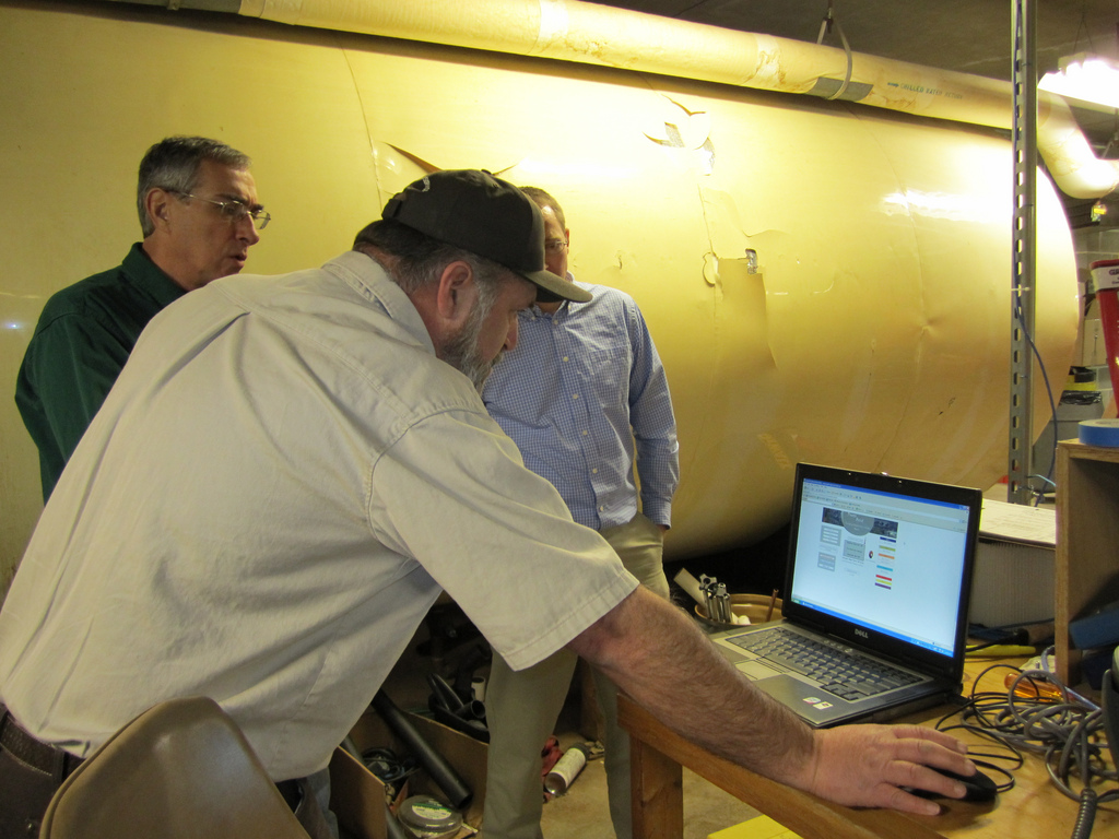 DeSoto NWR maintenance worker demonstrates HVAC system maintenance.