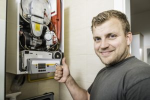 technician working on furnace